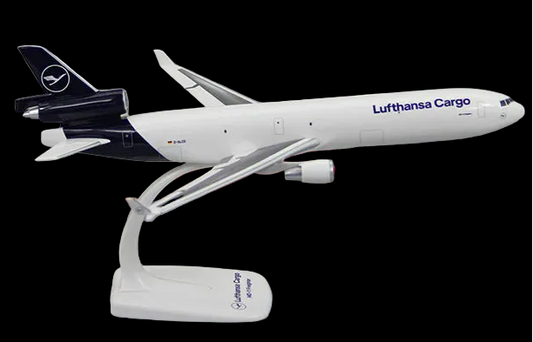Model airplane of Lufthansa Cargo on a stand with packaging in the background